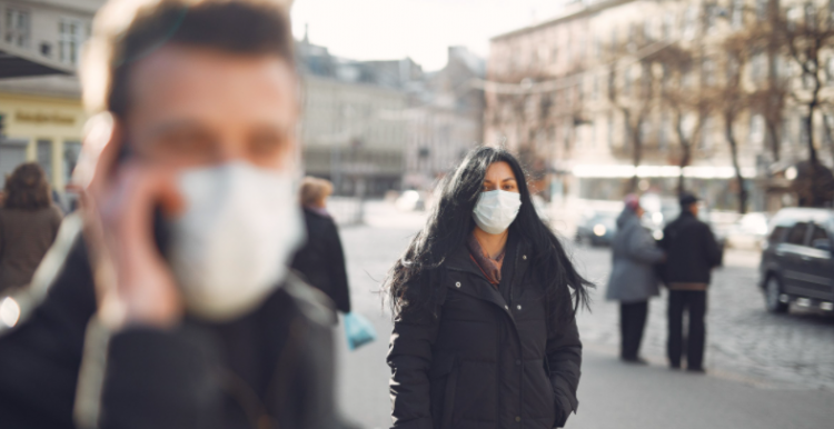 Two people with face masks