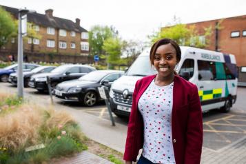 Woman standing outside of hospital