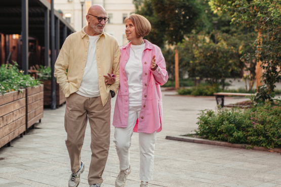 a couple in their 40's walking together